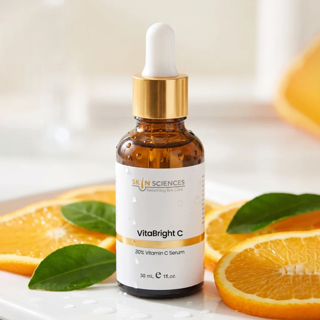 Bottle of 30% vitamin C serum with a dropper on a clean background